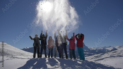 Friends throw up the snow