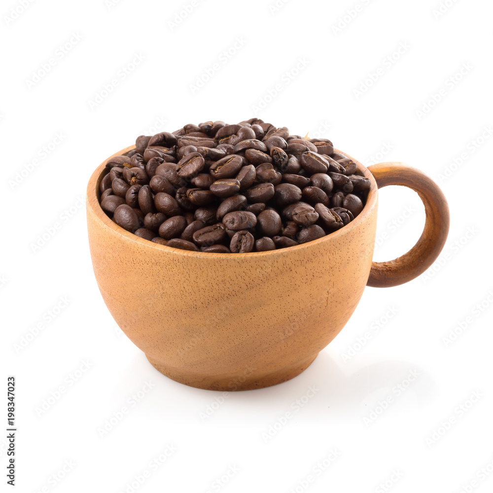 Coffee beans in wooden cup ioslated on a white background Coffee beans in wooden cup ioslated on a white background
