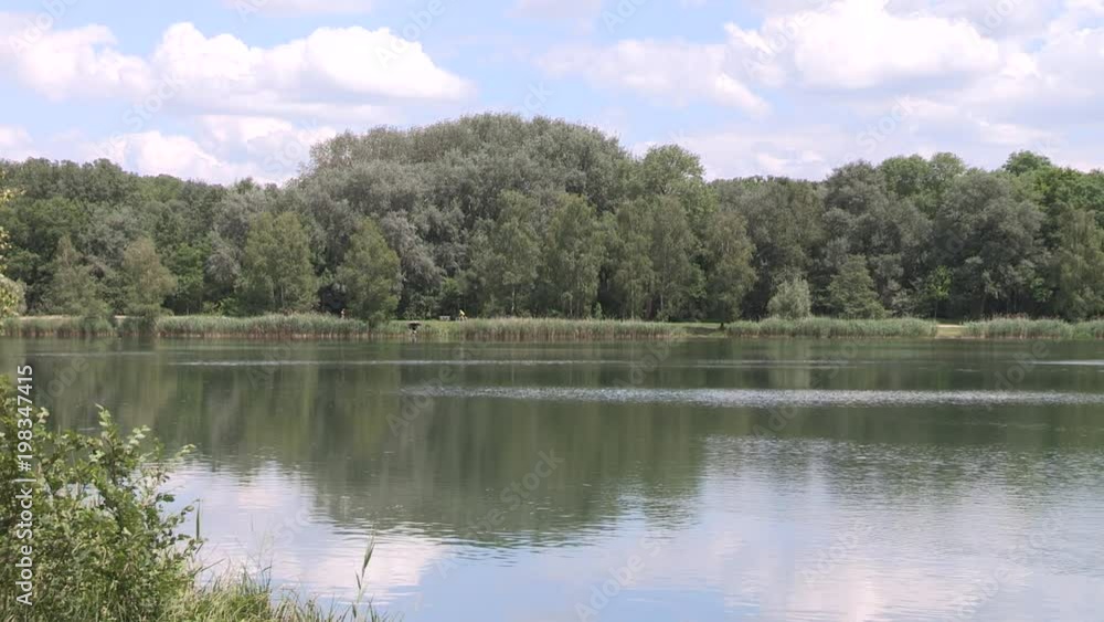 Lake Baggersee Ingolstadt in early summer, Bavaria, Germany. Lake Baggersee Ingolstadt in early summer, Bavaria, Germany.