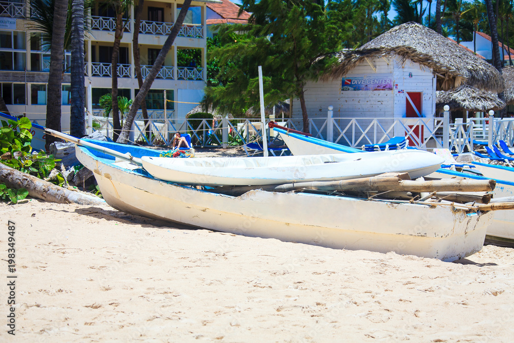 Boats on the beach in a beautiful sunny day in Punta Cana