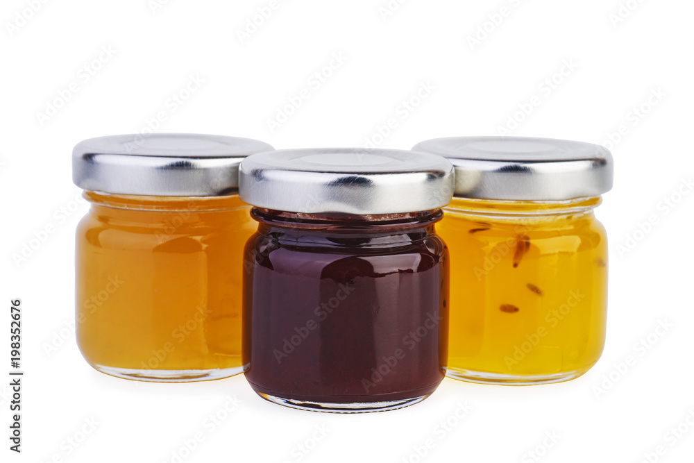 Three glass jars with different jam Three glass jars with different jam