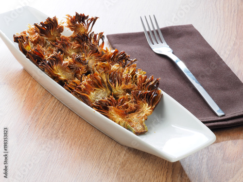 FRIED SLICED ARTICHOKES - ALCACHOFAS FRITASArtichoke slices deep fried in olive oil. Tasty vegan dish.