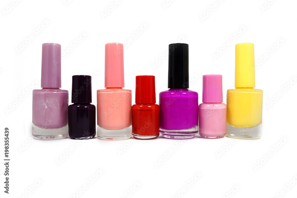 jars with nail varnish of different color and the size on a white background jars with nail varnish of different color and the size on a white background