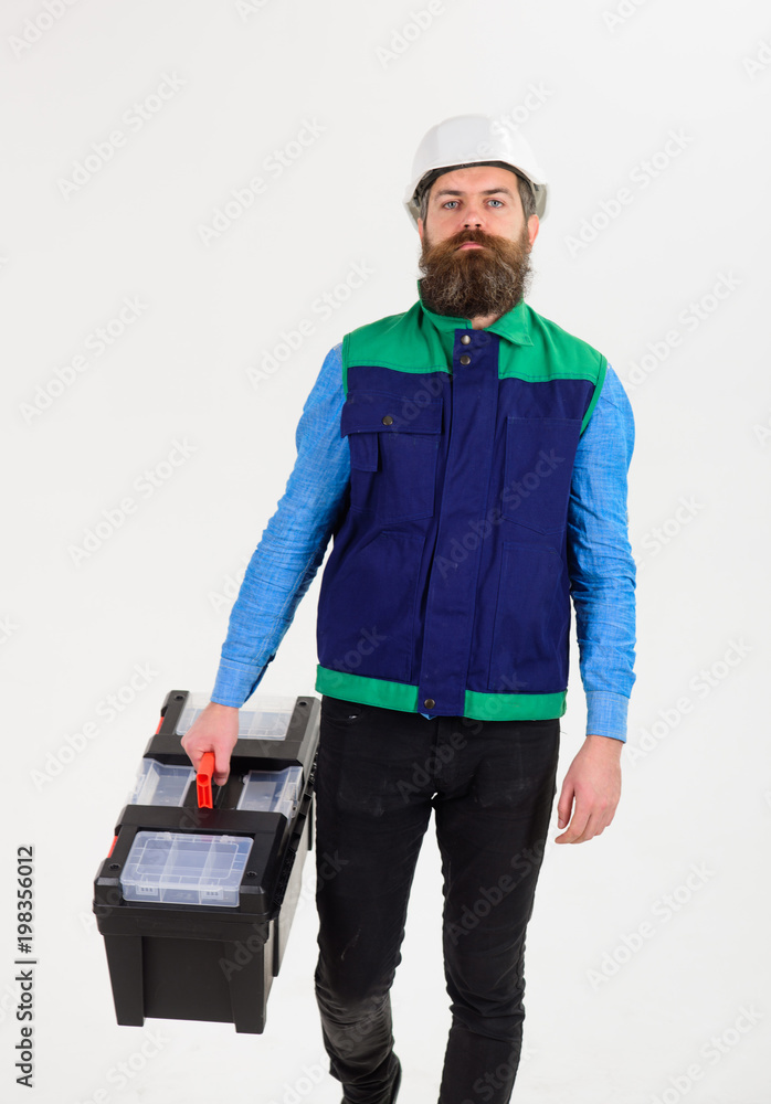 Man with beard and mustache holds toolbox isolated on white Man with beard and mustache holds toolbox isolated on white