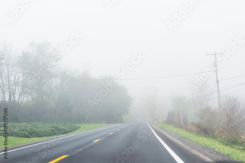 Foggy mist road highway with nobody in rural countryside in West Virginia