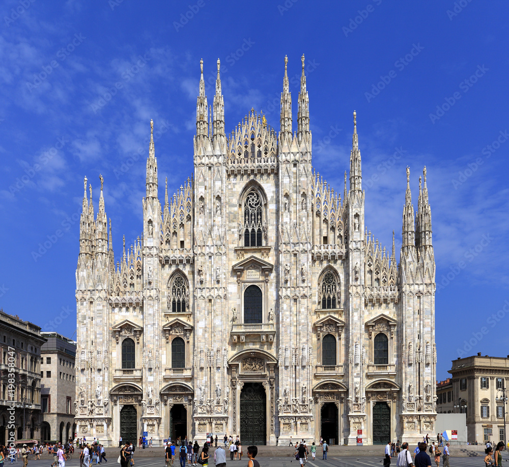 Italy, Milan - Exterior view of the Cathedral of St. Mary Nascente - Duomo Santa Maria Nascente di Milano at Piazza del Duomo - Cathedral Square