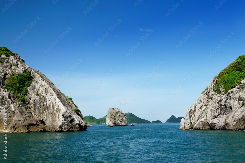 Vietnam -  rock island in Halong Bay National Park (UNESCO). The most beautiful and most famous tourist destination of Vietnam