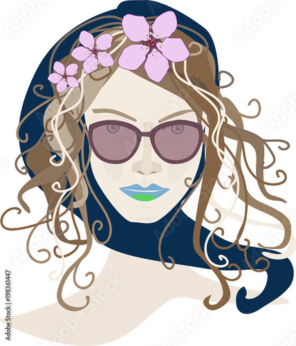 Portrait of a brunette girl in a hat and glasses