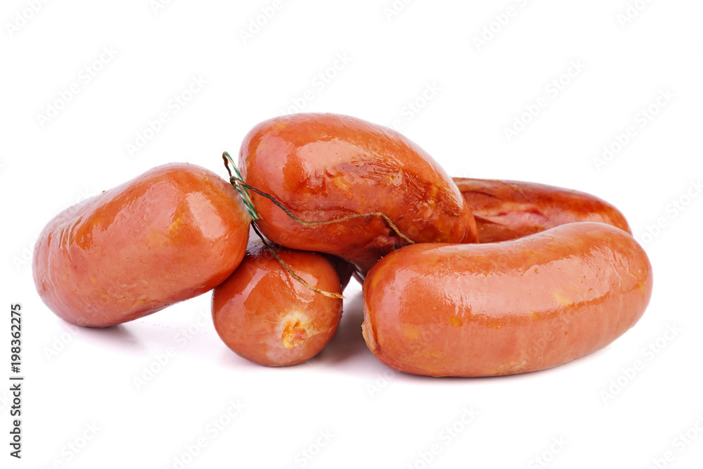 Grilled sausages isolated on the white background Grilled sausages isolated on the white background
