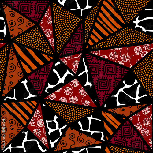 Ethnic boho seamless pattern in african style on black background. Tribal art print. Patchwork style. Vector image.