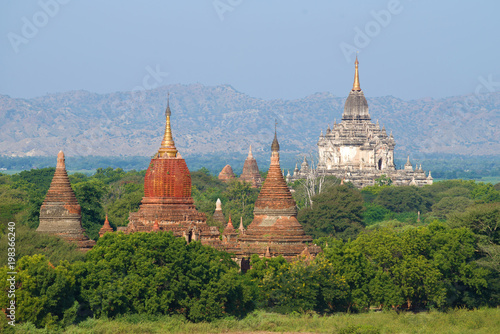 The tops of ancient Buddhist temples on a sunny afternoon. Bagan, Myanmar