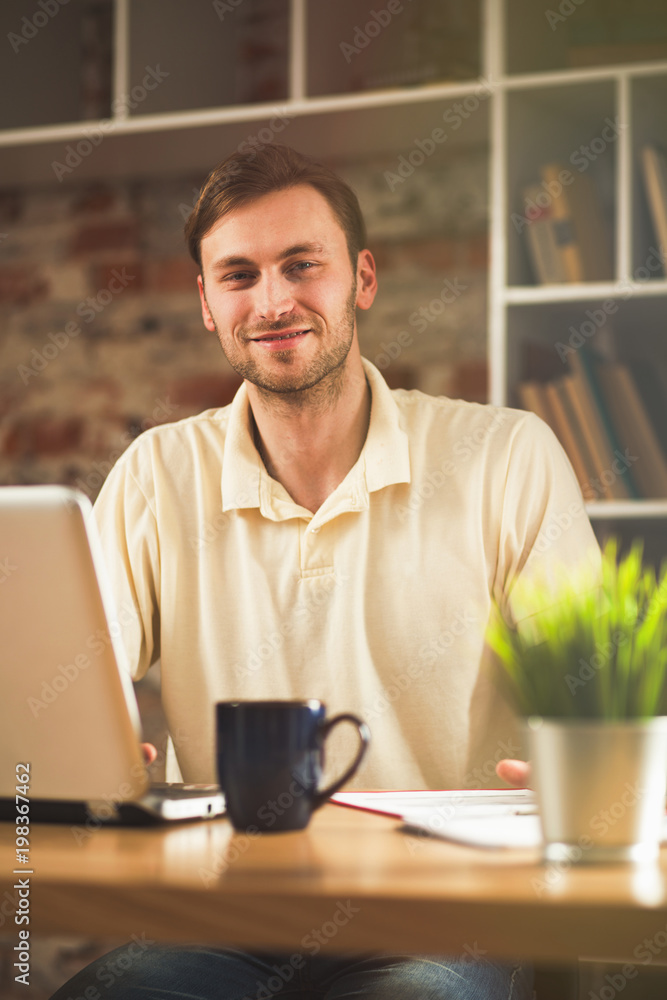 Young man with a laptop Young man with a laptop