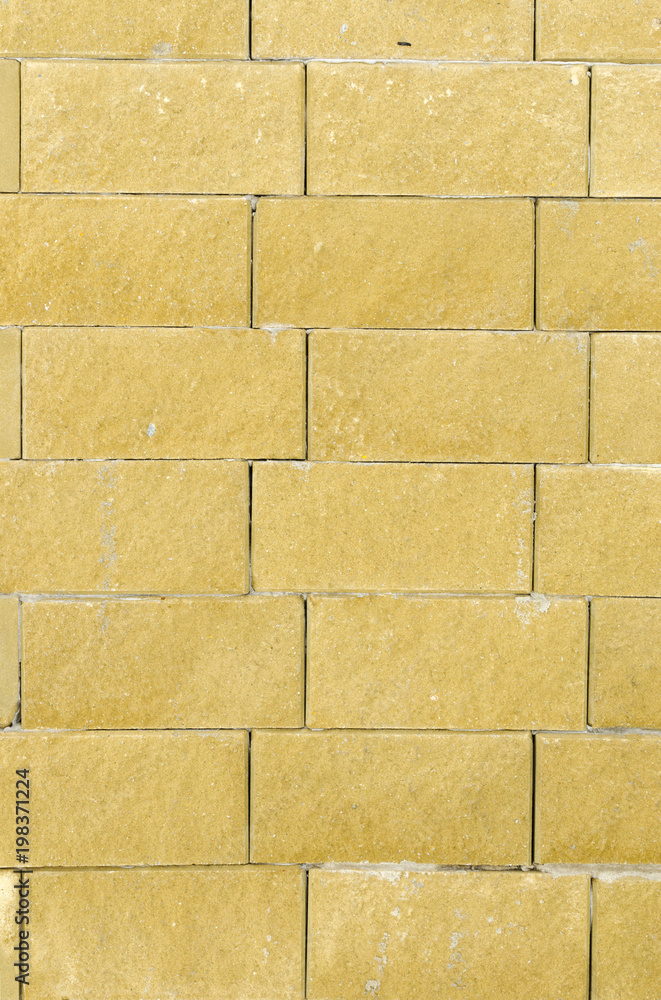 Naklejka premium Brick wall background.The texture of brick and stone walls.