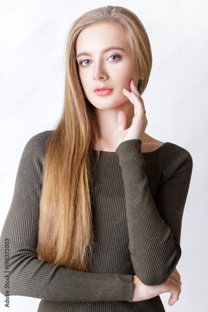 young girl posing in studio on white background young girl posing in studio on white background