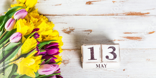 Spring Flowers and Wooden Blocks with Mothers Day Date, 13 May,