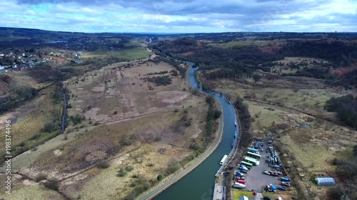 Aerial footage looking along the Forth and Clyde Canal from Kilsyth towards Falkirk. photo