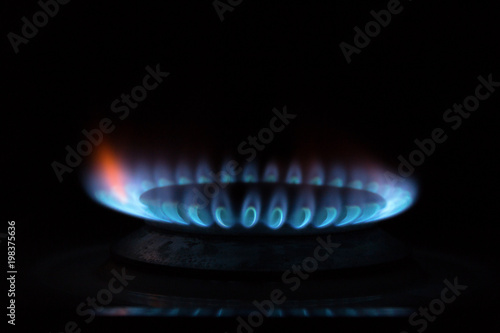 fire from a gas burner. dark background