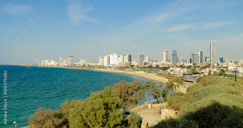 View of quay at Tel-Aviv with big building in the distance