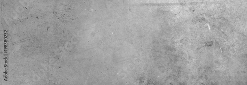 Grey textured cement or concrete wide banner wall background