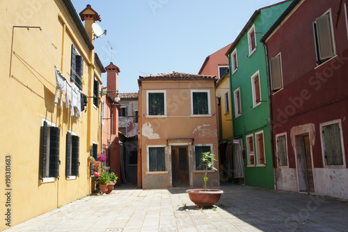 Small square with old typical houses in Venice, Italy