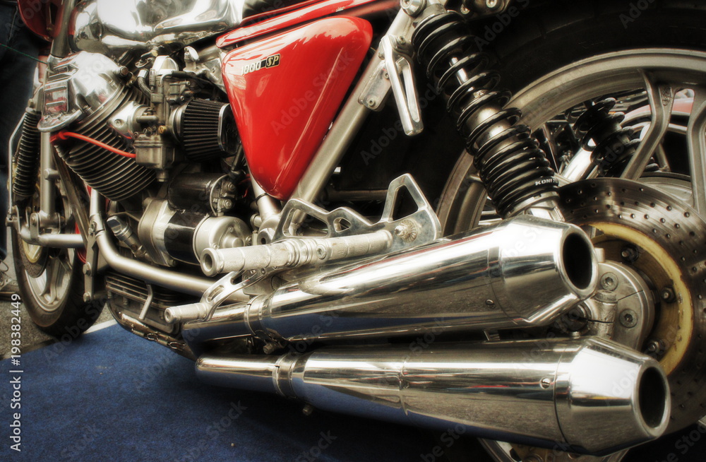 Italian classic motorcycle - exhaust detail Italian classic motorcycle - exhaust detail
