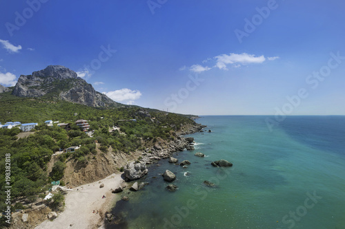  view of the mountain by the sea on a clear day in the Crimea