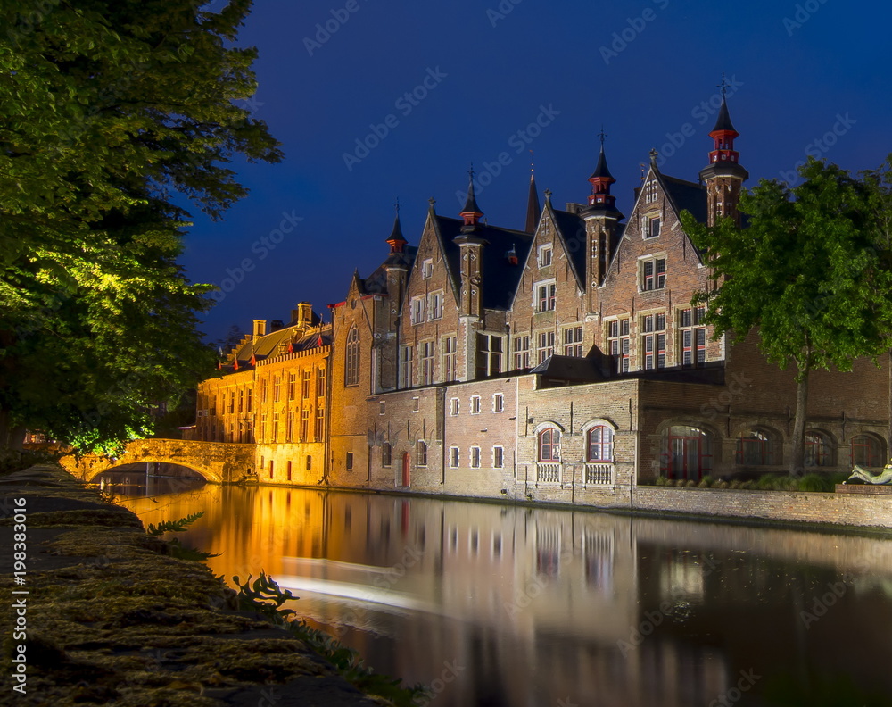 Night view of Steenhouwersdijk canal, Bruges, Belgium