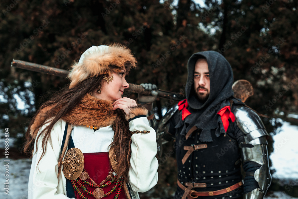 man and woman in historical costumes