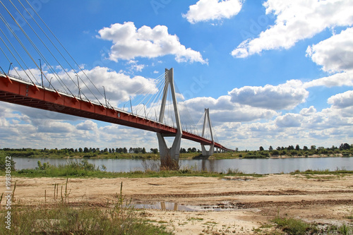 Summer landscape with a view of the cable-stayed bridge on the river Oka, Murom, Russia.