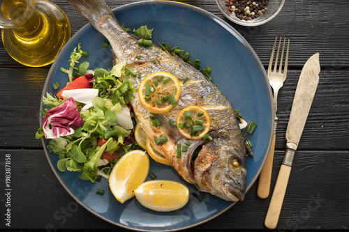 Grilled Dorado with lemon, thyme, rosemary and fresh salad