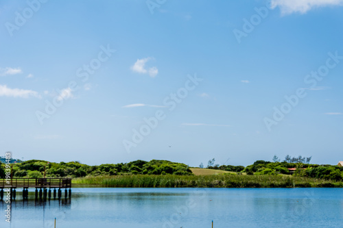 Small lagoon with a wooden bridge