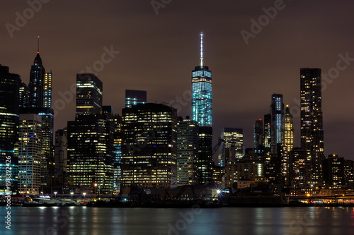 Downtown Manhattan night view from Brooklyn Bridge park © Dmitrii