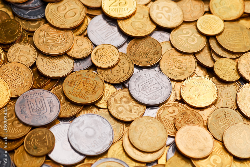 A large pile of coins from a Ukrainian bank. Ukrainian type coins: Kopeck. Concept for banking affairs, taxes, debt, A large pile of coins from a Ukrainian bank. Ukrainian type coins: Kopeck. Concept for banking affairs, taxes, debt,