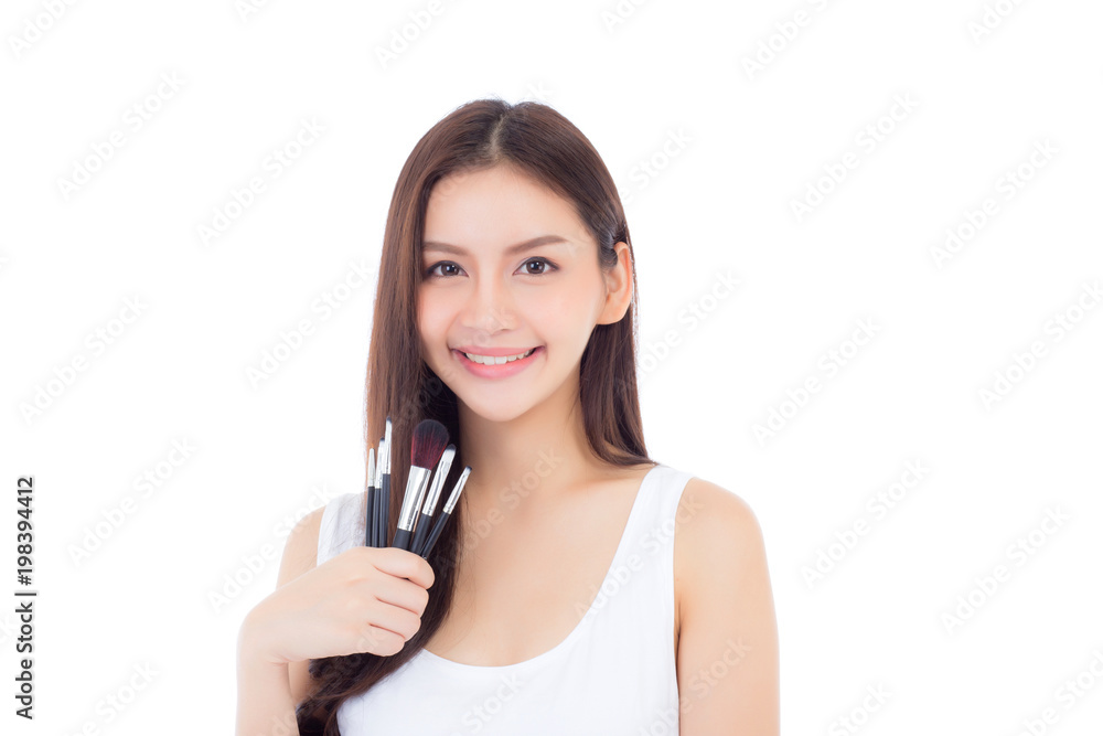 Beauty asian woman applying make up with brush on hand isolated on white background, beautiful of girl holding blusher, skincare and cosmetic concept. Beauty asian woman applying make up with brush on hand isolated on white background, beautiful of girl holding blusher, skincare and cosmetic concept.