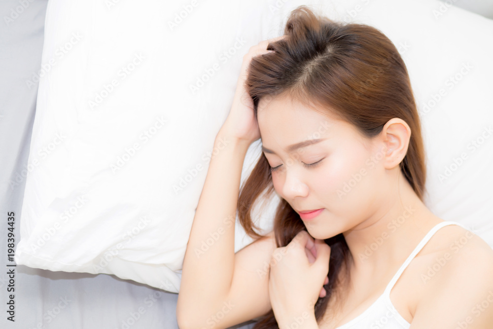 Beautiful asian young woman sleeping lying in bed with head on pillow comfortable and happy. girl with relax for health concept. Beautiful asian young woman sleeping lying in bed with head on pillow comfortable and happy. girl with relax for health concept.