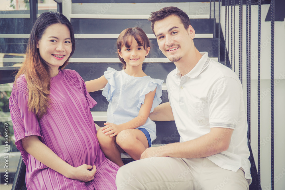 Portrait of man and pregnant of wife, asian handsome father take care mother and kid with couple and expect maternity have a happy, love of family concept. Portrait of man and pregnant of wife, asian handsome father take care mother and kid with couple and expect maternity have a happy, love of family concept.