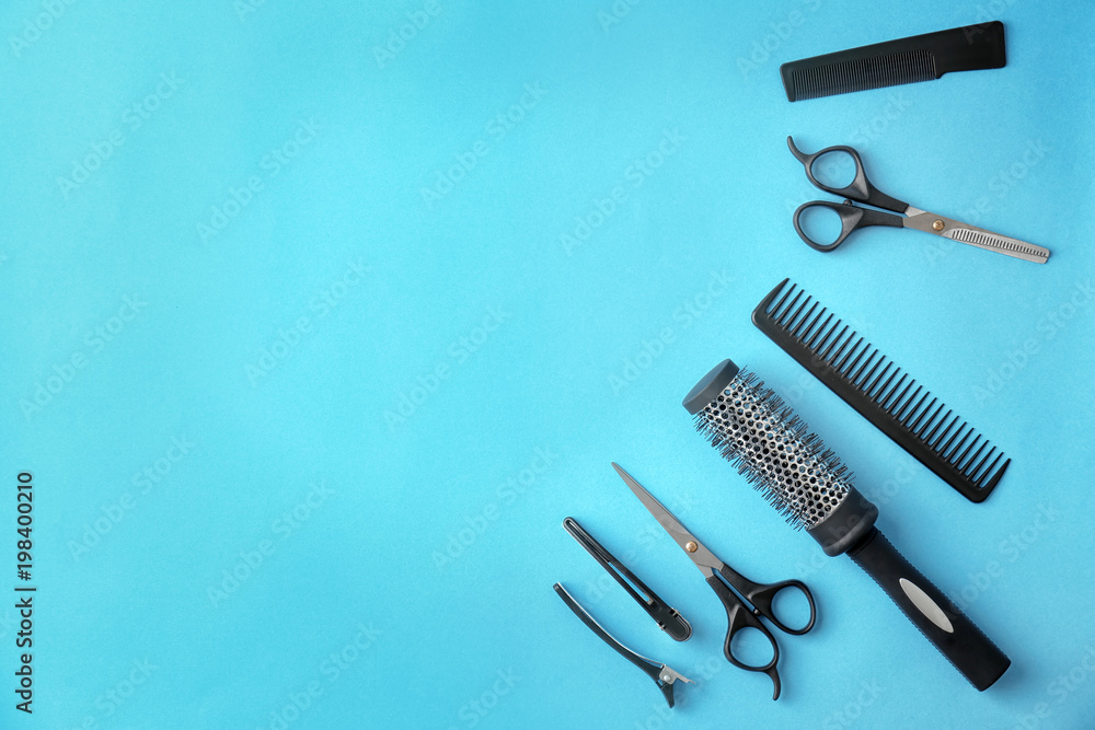 Flat lay composition with professional hairdresser tools on color background Flat lay composition with professional hairdresser tools on color background