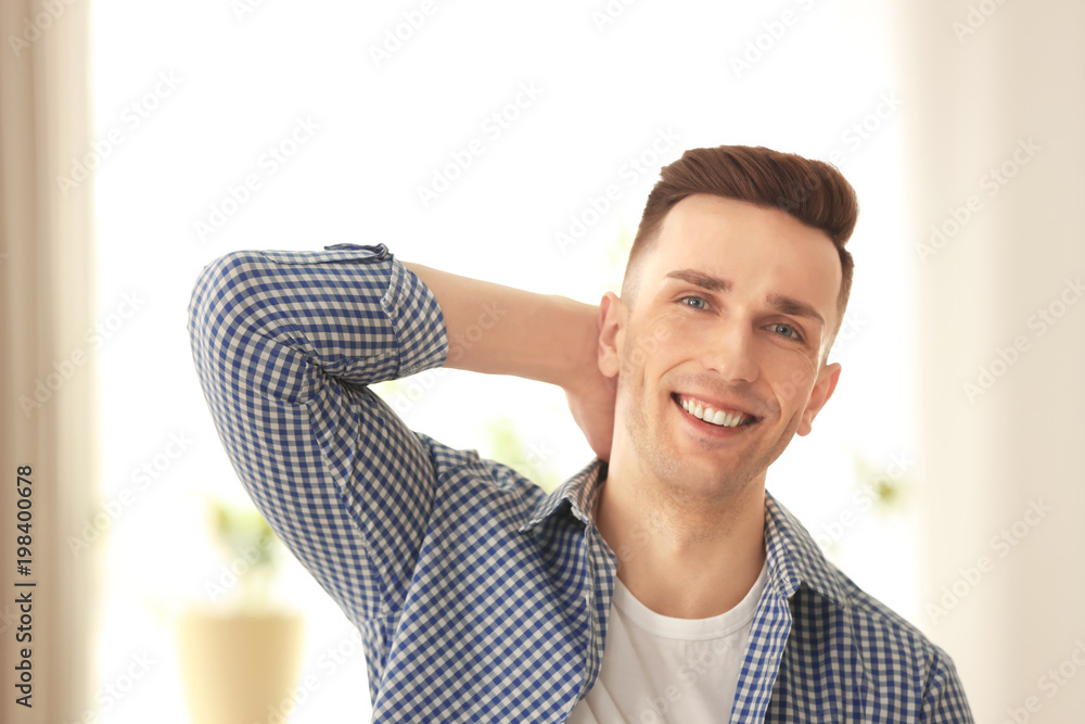 Portrait of young man with beautiful hair indoors Portrait of young man with beautiful hair indoors