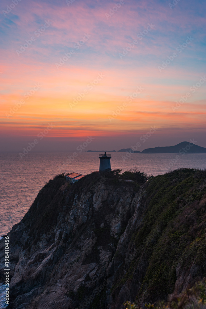 stunning sunrise with lighthouse
