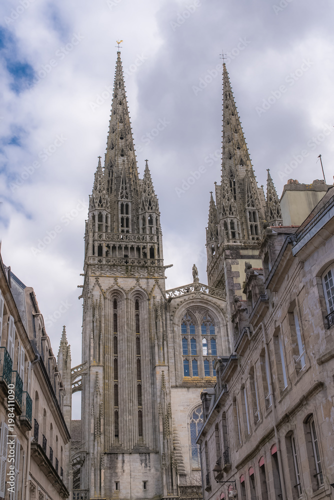 Quimper in Brittany, the Saint-Corentin cathedral, medieval street
