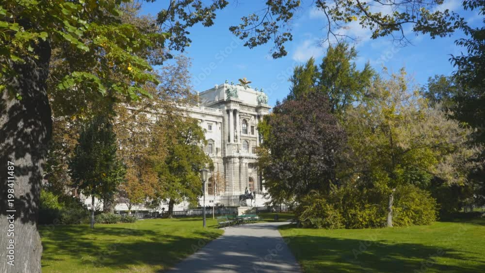 the hofburg palace as viewed from mozart park in vienna, austria the hofburg palace as viewed from mozart park in vienna, austria