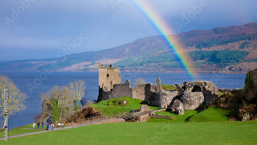 Rainbow in Urquhart Castle along Loch Ness lake in Scotland in a beautiful summer day, United Kingdom photo