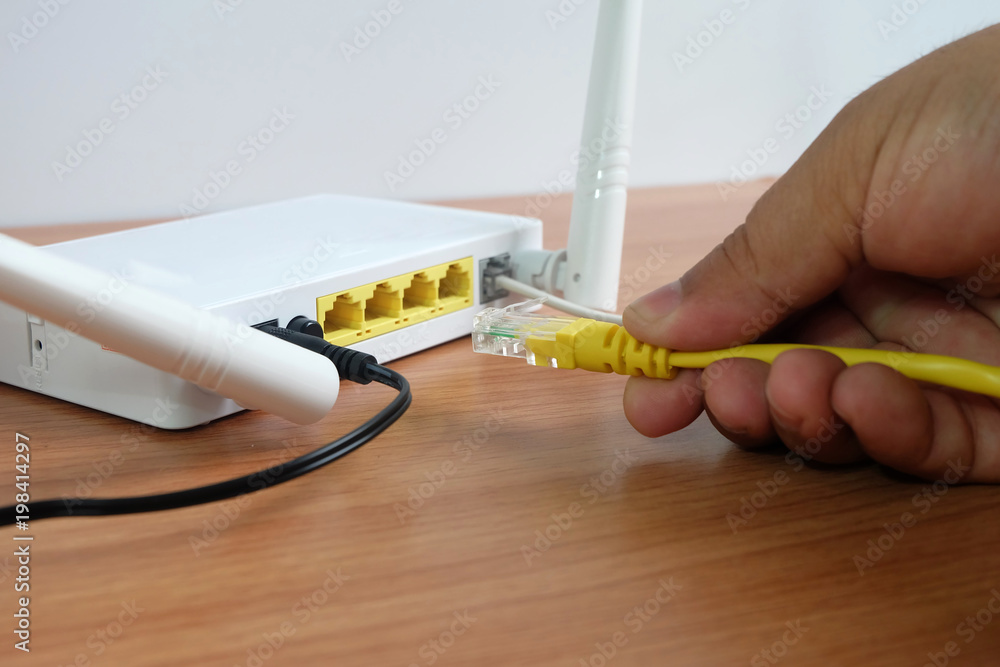 Modem router wifi wireless connect lan cable On wooden floor Stock Photo |  Adobe Stock