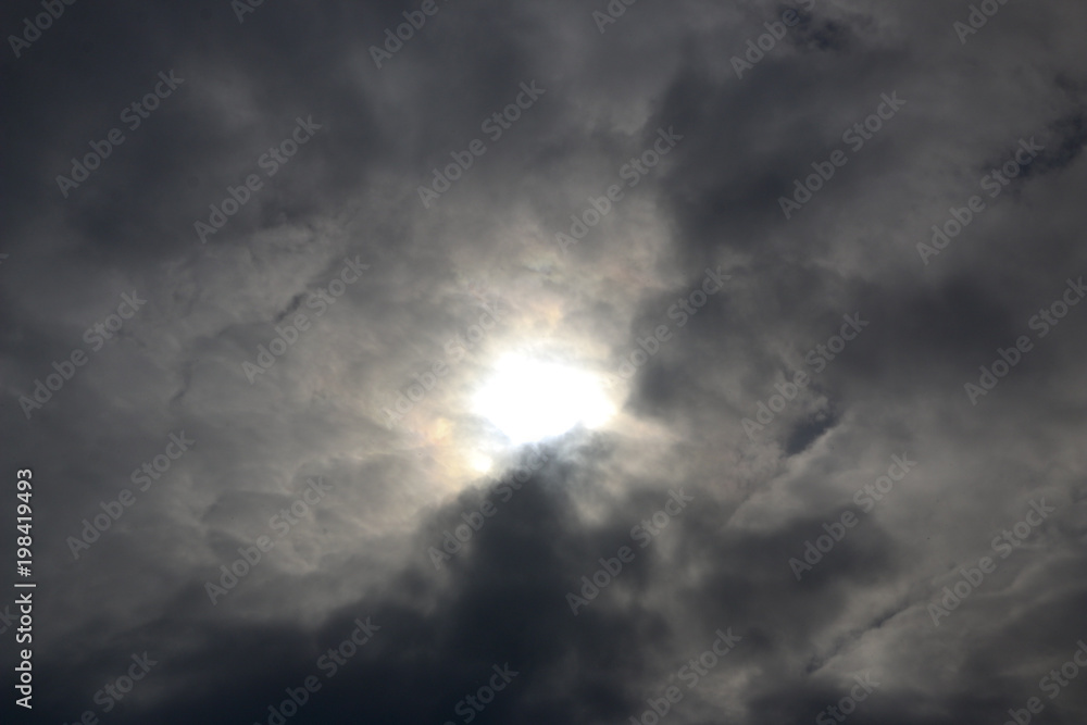 Spring. blue sky with fluffy white clouds. sun, sunlight, clouds, sky - spring changeable weather.