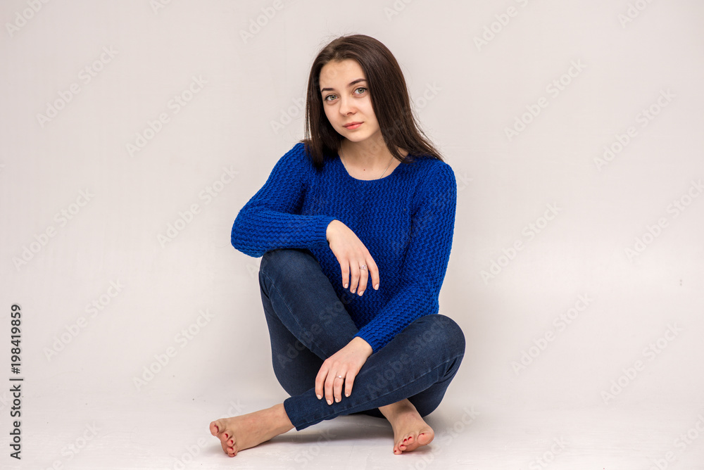 Cute brunette beautiful girl in different poses shows different emotions on different backgrounds in different clothes Cute brunette beautiful girl in different poses shows different emotions on different backgrounds in different clothes
