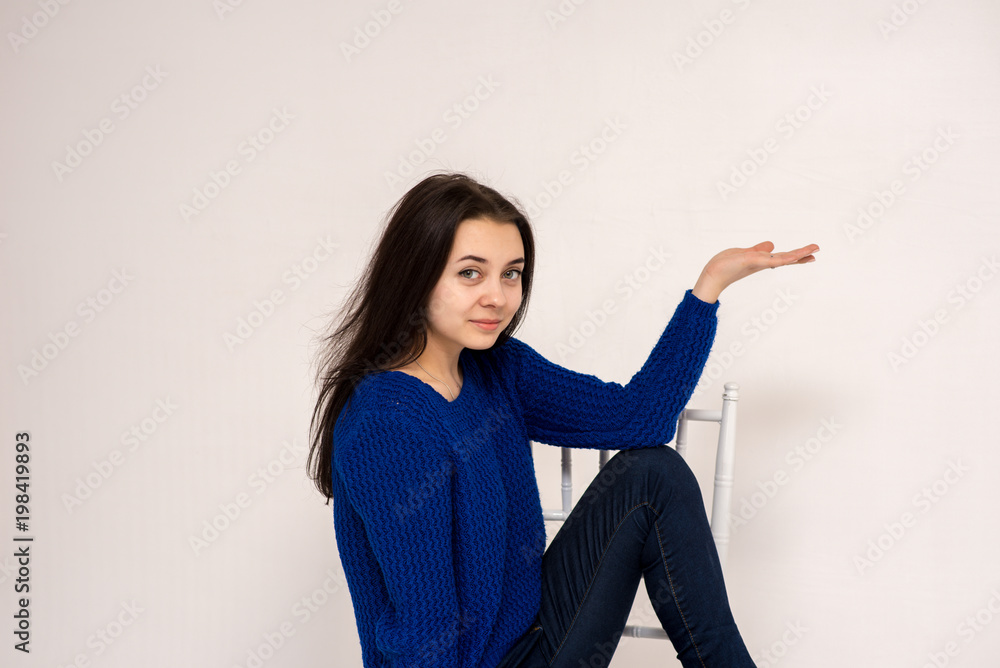 Cute brunette beautiful girl in different poses shows different emotions on different backgrounds in different clothes Cute brunette beautiful girl in different poses shows different emotions on different backgrounds in different clothes
