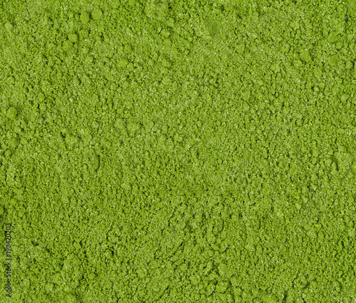 Background of green powder, border surface close up of powdered green tea