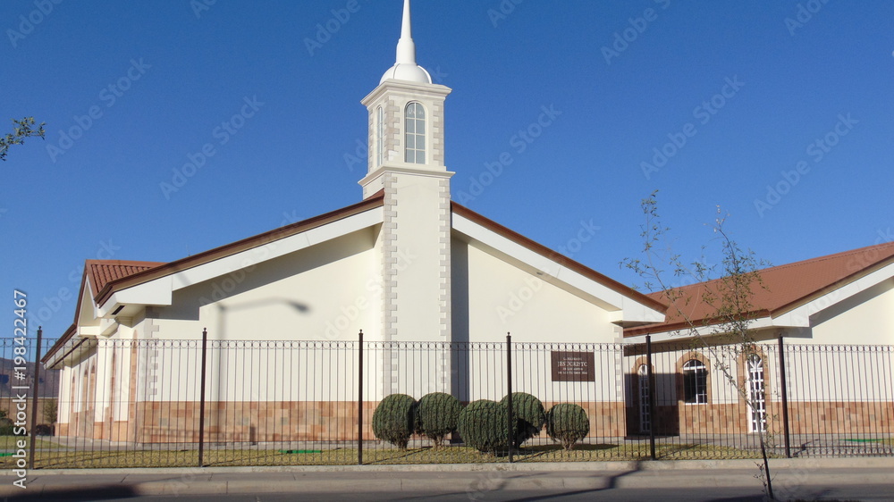 church with green trees