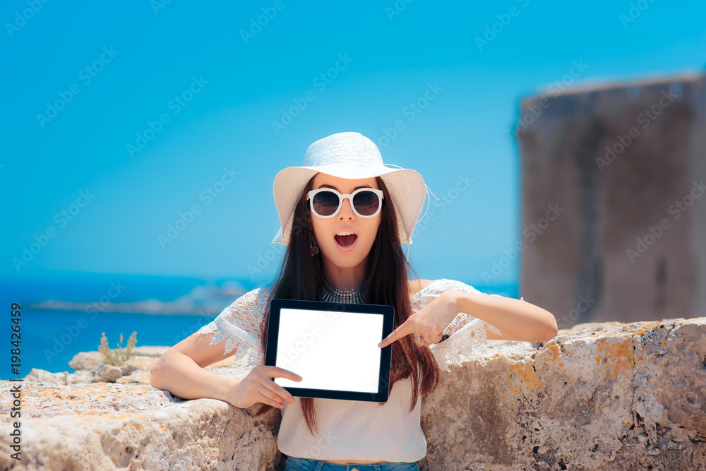 Female Tourist Holding PC Tablet in Travel Landmark Destination