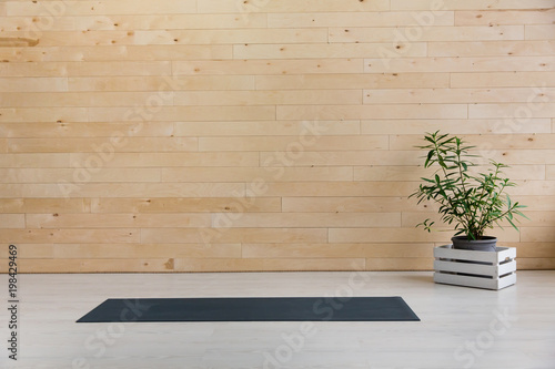 Gym with yoga mat on the floor
